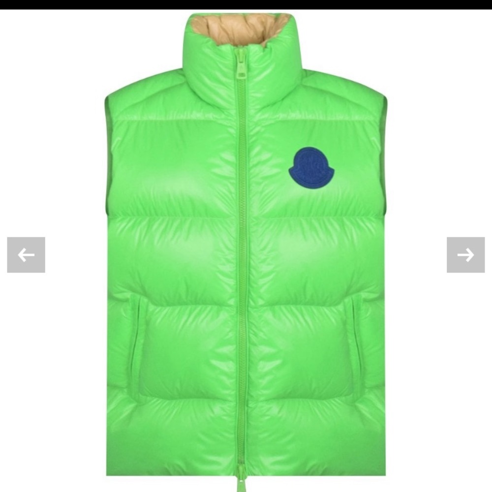 Beautiful moncler vest like green with blue moncler simble worn once.